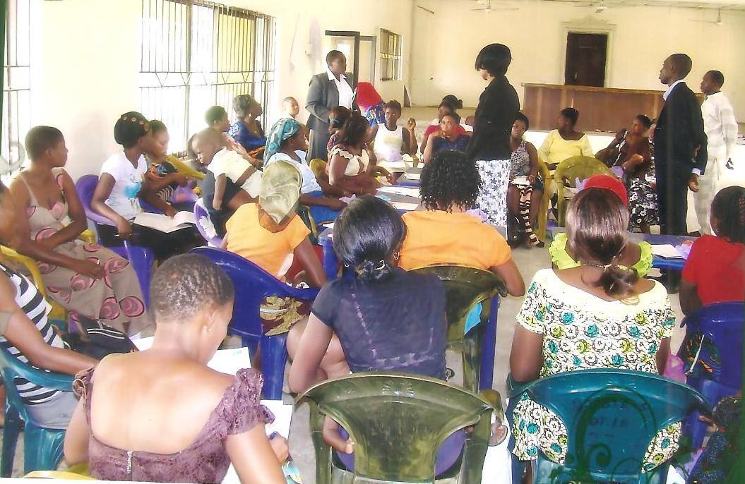 Women in discussion during a question and answer session at a training workshop in Isoko community.
