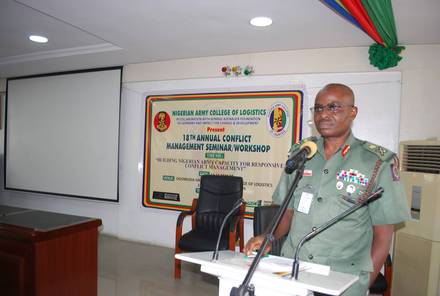 The Commandant addressing the seminar from the podium.