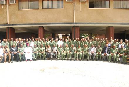 Group photograph of seminar participants and facilitators outside the College.