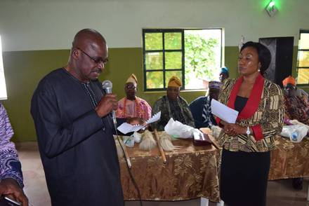 Participants standing at the forum to pledge their allegiance to peaceful elections.