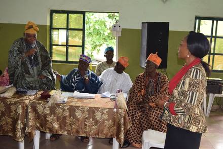 Traditional leaders seated together at the forum, committing to peaceful elections.